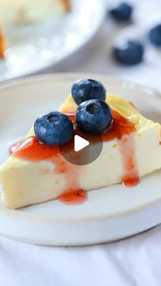 a piece of cheesecake with blueberries on top