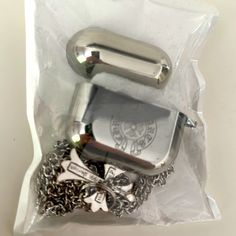 Chrome Hearts Silver Airpod Holder With Chain Sealed Never Used - Got As A Gift Unsure Of Authenticity Chrome Heart Vase, Chrome Hearts Airpod Case, Airport Case, Airpod Holder, Headphones Case, Tech Pouch, Wallpaper Iphone Disney Princess, Airpod Cases, Phone Charms