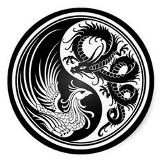 a black and white dragon design on a round metal object with the words whit and blk dragon written in it