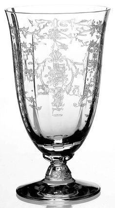 an ornate glass vase is shown in black and white