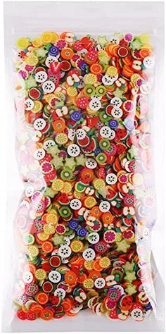 a bag filled with lots of colorful buttons