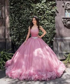 Every one of our gowns is designed to make you look amazing without breaking the bank. Each dress exhibits quality and attention to detail, ranging from delicate pastels to rich, brilliant colors, providing you with the ideal balance of cost and style. Elegant Quinceanera Gown With Sweetheart Neckline, Elegant Gown With Sweep Train For Quinceanera, Elegant Evening Dress With Fitted Bodice For Quinceanera, Elegant Ball Gown For Quinceanera, Elegant Gown With Fitted Bodice For Quinceanera, Elegant Fitted Bodice Gown For Quinceanera, Elegant Pink Dress For Quinceanera, Elegant Fitted Evening Dress For Quinceanera, Pink Dress For Wedding