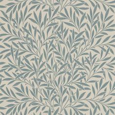 a brown and white wallpaper with leaves on it