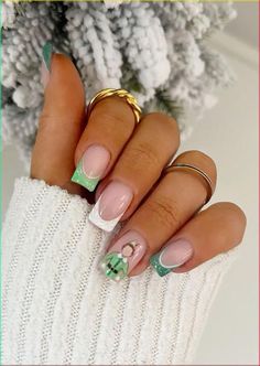 Get ready to spread holiday cheer with these adorable Buddy the Elf Christmas nail designs! Inspired by everyone's favorite elf, these nail ideas will bring a touch of whimsy and festive spirit to your holiday look. Whether you're a fan of the movie or simply want to embrace the joyful and playful nature of Buddy, these nail designs are sure to make you smile. Channel your inner Buddy with a vibrant green manicure. Opt for a solid green base or get creative with patterns and accents. Add some sparkle with glitter or go for a matte finish for a modern twist. Don't forget to incorporate Buddy's signature yellow accents for a pop of color. Embrace Buddy's love for all things Christmas with nail art featuring iconic holiday elements. Paint tiny Christmas trees, candy canes, or snowflakes on Green Christmas Nails, Green Manicure, Festive Christmas Nails, Classy Nail Art Ideas, Silver Nail Polish, Holiday Nail Designs, Christmas Nails Acrylic, Cute Gel Nails