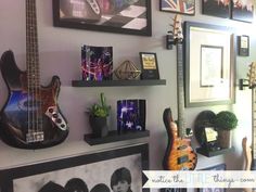 the wall is filled with guitars and pictures