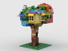 the lego tree house is made out of multi - colored blocks