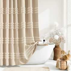 a bath room with a tub and a curtain