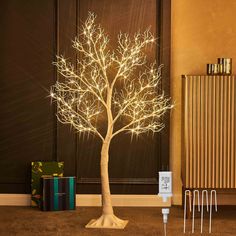 PRICES MAY VARY. 【Distinctive Design】: New-designed pre lit tree, totally 4ft high. Dotted with 150 fairy lights add a touch of winter elegance to your Chritmas decor 【Lifelike Look】: The pre-lit lighting tree is handmade and exquisitely crafted to look like a wonderful piece of art. Life-like white bark texture create a natural and romantic atmosphere at home on winter holidays or festivals 【Indoor Outdoor Decor】: IP44 waterproof, the twig tree lights make a prefect indoor outdoor fireplace, pa White Twig Tree, Indoor Outdoor Fireplaces, Tree With Lights, Twig Tree, Prelit Tree, Unique Christmas Decorations, Light Coral, Outdoor Home, White Tree