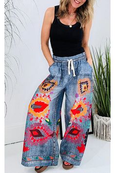 Details
	Size Chart



	
	
		
		
			
			
				These hippie print trousers combine the classic look of denim with a unique printed floral design. The elasticated waistband features a drawstring for comfort and style. In addition to its long, wide legs, these pants offer a flattering and stylish silhouette.
				 
				 
				
					Length: Ankle-Length
					Material: Polyester
					Elasticated waist with ties
					Style: Vacation Wear
					Fit Style: Loose Fit
				
				
				@Note:
				Size: please check measurements carefully
				Please allow 0.5-1" difference due to manual measurement
				Different monitor settings means colors may differ slightly
				1" = 2.54cm
				@
				
				
				

				
					
						
							Size(inch)
							Waist
							Hips
							Bottom length
						
						
							S Denim Print, Summer Lace, Winter Pants, Vacation Wear, Floral Denim, Printed Trousers, Tie Styles, Type Of Pants, Women Pants Casual