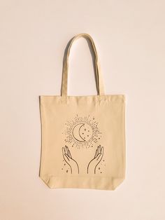 -Hand printed -Can hold up to 30 pounds -Machine washable, air dry -Eco-friendly way to bring around your favorite items! Perfect for grocery shopping, retail shopping, farmers markets, using as a purse, book bag, or beach bag. Eco-friendly Ink Canvas Tote Bag For Travel, Beige Reusable Bags For Daily Use, Practical Reusable Bags For Daily Use, Eco-friendly Ink Tote Bags For Everyday Use, Reusable Canvas Tote Bag For Travel, Reusable Tote Canvas Bag For Travel, Reusable Canvas Travel Bags, Minimalist Shopping, Bag Minimalist