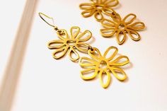 Earrings Gold Drop Dangle Flower Daisy Brass Boho Modern | Etsy Everyday Bohemian Dangle Flower Earrings, Bohemian Brass Flower Earrings, Bridal Favors, Daisy Charm, Flower Daisy, Boho Modern, Lavender Sachets, Feb 8, Jewelry Photography