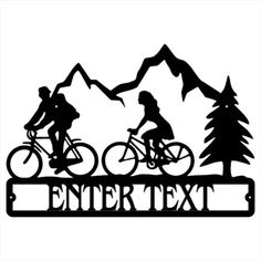 a metal sign that says enter text with two people riding bikes in the mountains behind it