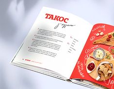 a cookbook opened to the contents of a taco recipe on a table with condiments and ketchup