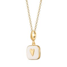 Embrace the enduring beauty of this 18ct gold plated locket necklace. Crafted with high-quality materials, it features a classic heart shape highlighted by crisp white enamel. This piece is more than just an ornament; it's a cherished keeper of your most treasured memories. Open the locket to hold tiny photographs close to your heart, adding a touch of sentimental value to your everyday style.  All our charms attach with a clip-on clasp and are compatible with all other leading charm jewellery brands. Simply clip-on or slide-on to a chain, charm bracelet or charm carrier necklace.  All Lily Charmed jewellery comes presented in a beautiful gift box hand tied with ribbon. Material: 18ct Gold Plated Recycled Sterling Silver with White Enamel.  At Lily Charmed, we strive to provide our custome Chain Charm Bracelet, Heart Locket Necklace, Locket Charms, Box Hand, Heart Locket, White Heart, Recycled Sterling Silver, Watch Necklace, Locket Necklace