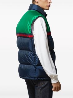 Padded vest by GUCCI in blue and green characterized by logo patch, sleeveless, button closure and drawstring waist. This item is in size 48 and the color is Gucci Outerwear With Pockets For Streetwear, Gucci Cotton Outerwear With Pockets, Gucci Sporty Streetwear Outerwear, Gucci Sporty Outerwear For Streetwear, Sporty Gucci Outerwear For Streetwear, Casual Green Vest Outerwear, Gucci Casual Cotton Outerwear, Casual Gucci Cotton Outerwear, Blue Sporty Sleeveless Outerwear