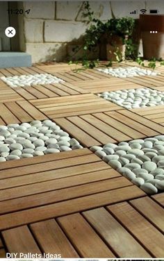 a wooden deck with white balls on it