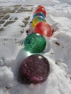 an image of some balls in the snow with caption for facebook post on them