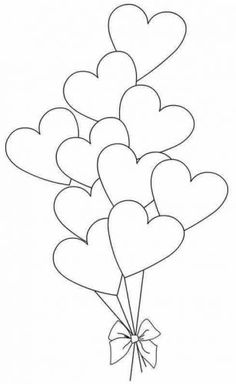 a bunch of heart shaped balloons with a bow