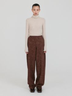 This is a trendy and modern pants by EENK that is made out of high quality and sturdy material. With distinctive mood of the design and comfortable wear, you can style it for your casual daily outfit.- Balloon silhouette denim pants- Comfortable wear with side zipper- Unique look without waistband Modern Relaxed Fit Fall Pants, Modern Fitted Brown Bottoms, Modern Straight Pants For Winter, Modern Bottoms For Fall, Modern Wide Leg Pants For Fall, Modern Wide-leg Pants For Fall, Modern Pants For Fall, Modern Trousers For Fall, Balloon Silhouette