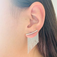 These statement silver fringe earrings are elegant for going out somewhere special; their dangling chains make your face look expressive. Fringed earrings are ideal for a romantic dinner, a wedding, or an event. You will love having them in your jewelry box. We have them in two tones: Silver Tassel and Gold Fringe Earrings. You will look spectacular! Choose yours, and we will prepare it for you. ITEM DESCRIPTION Silver Tassel Earrings Gold Tassel Earrings  - Length: 36.5 mm - Material: -Gold Fil Silver Dangle Earrings With Tassels, Silver Tassel Earrings With Fringe As Gift, Trendy Silver Dangle Tassel Earrings, Silver Long Drop Earrings With Tassels, Silver Dangle Tassel Earrings For Pierced Ears, Silver Dangle Tassel Earrings With Fringe, Silver Fringe Drop Earrings, Trendy Silver Tassel Drop Earrings, Silver Tassel Drop Earrings For Pierced Ears