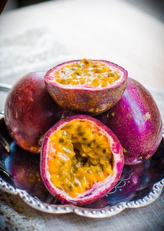 the fruit is cut in half and ready to be eaten on the plate for consumption