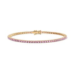 Enhance your jewelry collection with the captivating beauty of our Pink Sapphire Tennis Bracelet. Adorned with vivid pink gemstones, this exquisite piece radiates elegance and charm. Available in 14K Yellow Gold and White Gold Carat weights are reflective of a 7in bracelet. Shorter lengths will have lower carat weights that those listed. Gemstones are natural, therefore colors may vary Pink Sapphire Tennis Bracelet, Classic Pink Tennis Bracelet With Jubilee Style, Classic Pink Tennis Bracelet With Jubilee Design, Pink Jubilee Tennis Bracelet In Classic Style, Classic Pink Tennis Bracelet, Formal Pink Gemstone Tennis Bracelet, Classic Pink Bracelets, Pink Jubilee Round Tennis Bracelet, Pink Diamond Tennis Bracelet With Jubilee Design