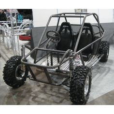 an off - road vehicle is on display in a showroom