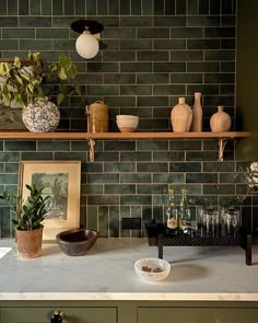 the kitchen counter is clean and ready to be used as a place for drinks or desserts