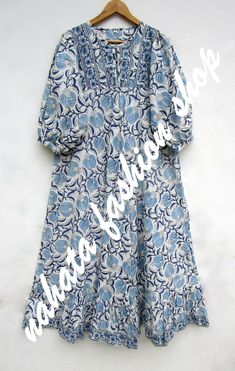 ITEM DESCRIPTION coolest blue flower look maxi dress - Henley neckline with button maxi dress - 3/4th sleeve with button maxi dress  Features: 3/4thsleeve, Henley neck, Long dress Material: Cotton cambric Fabric: 100% cotton soft light weight ethnic print fabrics  Sleeve Length = 18 inch For more sizes & their measurement, please refer our below chart to understand the sizes variations available with us For your size requirement, please mention your size in seller note at the time of buying. SIZ Blue 3/4 Length Midi Dress For Summer, Blue Summer Midi Dress 3/4 Length, Blue Half-sleeve Midi Dress For Summer, Blue Half Sleeve Midi Dress For Summer, Summer Floral Print Half Sleeve Maxi Dress, Blue Spring Dress 3/4 Length, Blue 3/4 Length Spring Dresses, Fitted Half Sleeve Blue Maxi Dress, Blue Fitted Half Sleeve Maxi Dress