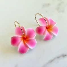 Plumeria Flower Hoops Fun Hawaiian Pink plumeria flowers on 14k gold fill endless hoops. Hoops approx. 30mm. Shop~ http://www.etsy.com/shop/HanaMauiCreations?ref=pr_shop_more International buyers please read our shipping policies before ordering~ POLICIES~ https://www.etsy.com/shop/HanaMauiCreations/policy?ref=shopinfo_policies_leftnav Pink Flower-shaped Jewelry For Vacation, Pink Flower Jewelry For Vacation, Summer Flower Charm Hoop Earrings, Flower Shaped Hoop Earrings For Summer Gifts, Flower Shaped Hoop Earrings For Summer, Gold Flower-shaped Earrings For Beach, Adjustable Flower-shaped Earrings For Vacation, Flower-shaped Earrings For Vacation, Pink Flower Hoop Earrings For Summer