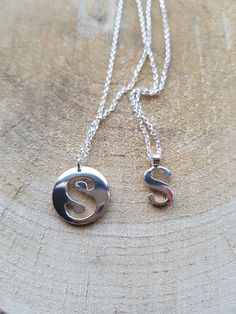 Letter S Necklace Letter Necklace Initial Necklace S Necklace Initial S Necklace Letter S Personalised Jewellery This is a listing of handmade sterling silver letter s necklace. The pendant is 21 mm in size ed in 16 or 18 inches sterling silver chain. Please see options. Necklace is available in letter s charm and the disc pedant. Item will come in a gift boxed. Similar item. https://www.etsy.com/uk/shop/flowerpecker?ref=seller-platform-mcnav&section_id=16084974 Mother's Day Silver Initial Pendant Necklace, Silver Initial Pendant Necklace Nickel Free, Silver Monogram Pendant Charm Necklace, Mother's Day Sterling Silver Initial Necklace With Round Pendant, Silver Monogram Pendant Necklace, Silver Pendant Necklace With Monogram, Silver Initials Pendant Necklace, Sterling Silver Initials Charm Pendant Necklace, Silver Initial Necklace With Round Pendant As Gift