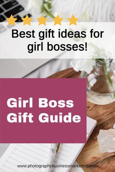 the girl boss gift guide is on top of a wooden table with flowers and notepads