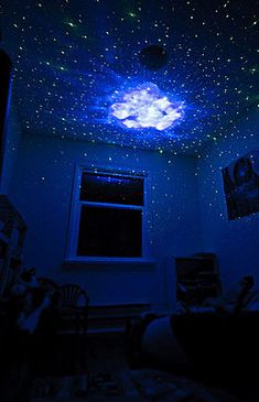 the ceiling is covered in stars and glows blue