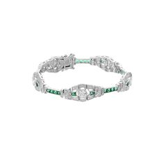 Add a pop of color to your jewelry collection with this Art Deco-inspired green and clear cubic zirconia link bracelet. Add a pop of color to your jewelry collection with this Art Deco-inspired green and clear cubic zirconia link bracelet. Clasp: box Metal: sterling silver Length: 7.25 in. Packaging: boxed Plating: sterling silver Finish: polishedSTONE DETAILS Stone type: cubic zirconia Total weight: 5 3/8 ct. Shape: round, baguette Gemstones may have been treated to enhance their appearance. Sp Green Cubic Zirconia Diamond Bracelet For Formal Occasions, Luxury Green Cubic Zirconia Bracelets, Gift Multi-stone Cubic Zirconia Diamond Bracelet, Luxury Green Cubic Zirconia Bracelet, Luxury Multi-stone Cubic Zirconia Bracelets, Art Deco Inspired, Link Bracelets, Cubic Zirconia, Color Pop