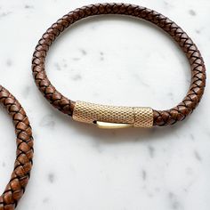 Bourbon Leather Gold Men’s Bracelet - 3 sizes - BelleStyle Elegant Brown Leather Braided Bracelets, Elegant Brown Leather Braided Bracelet, Everyday Braided Leather Bracelets, Brown Leather Bracelets With Brass Hardware, Leather Bracelet With Stainless Steel Clasp For Everyday, Adjustable Gold Leather Bracelet With Stainless Steel Clasp, Classic Braided Leather Bracelets, Adjustable Leather Bracelet With Gold Clasp, Gold Leather Bracelets For Everyday Use