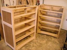 two wooden shelves sitting next to each other