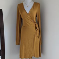 Brand New, Never Word With Tags. Super Cute Deep Plunge Faux Wrap Dress. The Color Is A Deep Mustard Yellow, A Great Addition For Your Fall Wardrobe. Fall Mini Dress With Tie Waist And Surplice Neckline, Fall Surplice Neckline Wrap Dress For Brunch, Fall Wrap Dress With Surplice Neckline For Brunch, Surplice Neckline Wrap Dress For Fall Brunch, Spring Fitted Mini Dress With Faux Wrap, Faux Wrap Dress For Night Out In Fall, Fitted Wrap Dress For Day Out, Faux Wrap Dress For Fall Night Out, Spring Fitted Faux Wrap Mini Dress