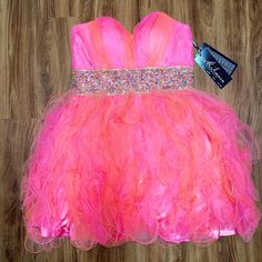 Beautiful Pink And Orange Gown With Gorgeous Beaded Detail Pink Ruffled Gown For Cocktail, Pink Formal Dress For Prom Season, Pink Sleeveless Homecoming Gown, Pink Strapless Dress For Homecoming, Pink Sleeveless Gown For Homecoming, Pink Formal Dress For Prom, Pink Fitted Dress For Prom Season, Pink Fitted Dress For Prom, Fitted Pink Dress For Prom Season