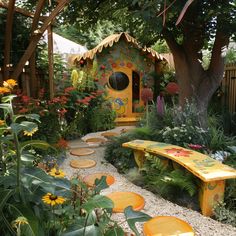 a yellow bench sitting in the middle of a garden filled with lots of plants and flowers