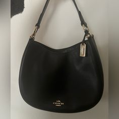 Excellent Used Condition. Black Leather With Gold Hardware. Purse Does Include Adjustable Carry Strap. Leather Shows Minimal Signs Of Wear, Hardware Has Some Scratches. There Is A Pen Mark In The Inner Leather Lining Of The Bag, It May Be Able To Be Taken Off But I Have Not Tried. Coach Hobo Bag With Double Handle, Coach Hobo Bag For Shopping, Coach Top Handle Hobo Bag For Shopping, Everyday Coach Bag With Gold-tone Hardware, Designer Coach Hobo Bag, Coach Hobo Bag With Gold-tone Hardware For Shopping, Everyday Coach Hobo Bag With Handle Drop, Coach Leather Handheld Bag, Coach Handheld Leather Bag