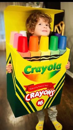 a little boy in a crayon box costume