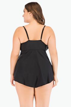 The Black Ruched Two Piece Tankini Plus Size Swimsuit is all you need to get through summer in style! Our plus size swimwear from Curvy Waves offer comfort and style combining with sexy prints and curve-hugging fit. With bold patterns that shout "summer's here" and sizes that go up to a 6XL, there's nowhere else to go bikini shopping for! Instantly lengthen the look of your legs with the high-cut hemline! Our tankinis are designed to make sure they fit you right. And by right, we mean no tummy r Black Swim Dress With Built-in Bra For Pool, Black Swim Dress With Built-in Bra For Beach Season, Vacation Swim Dress With Built-in Underwire Bra, Black Tankini With Built-in Bra For Vacation, Black Lined Tankini For Pool, Black One-piece Tankini For Pool, Black Tankini With Built-in Bra For Summer, Summer Black Tankini With Built-in Bra, Ruched Tankini For Swimming