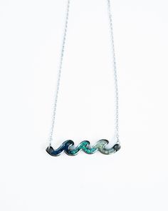 Dive into style with this stunning stone necklace set in durable stainless steel. The unique wave design features crushed stones in shades of blue and turquoise, each one with its own individual touch. Great for those who love to be by the sea. The wave necklace is made of natural gemstones and Jewelry grade Stainless Steel, high polished and shiny on both sides, oxidation resistant, never get tarnished or change color, hypoallergenic, nickel-free and lead-free, no irritation for sensitive skin. Stone Necklace Set, Wave Necklace, Crushed Stone, Scarf Gift, Cup Gifts, Wave Design, Cards Sign, The Wave, By The Sea