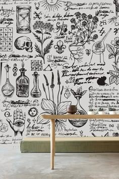 an artistic wallpaper with flowers and plants in black and white, on a wooden bench