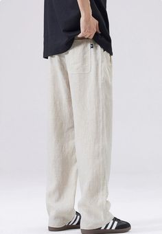 Discover the ultimate in comfort and style with our Slim Fit Elastic Waist Linen Trousers, perfectly blending functionality with a modern edge. Crafted from high-quality flax, these trousers offer a breathable and lightweight experience for all-day ease. The loose straight fit and solid color design evoke a sense of effortless sophistication, while the elastic waist provides a custom fit. Pocket decoration adds practicality and a touch of detail, making these trousers a go-to for any casual yet Casual Flax-colored Bottoms For Work, Casual Flax Bottoms For Workwear, Baggy Flax Pants With Pockets, Casual Flax Workwear Pants, Casual Flax-colored Work Pants, Casual Flax Pants For Workwear, Casual Flax Wide-leg Bottoms, Casual Flax Colored Cotton Pants, Casual Flax-colored Cotton Bottoms