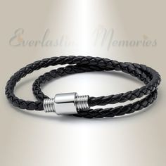 "Our Stainless Steel Reverent Cremation Bracelet is a highly personal way to carry a reminder of a loved one or pet with you.  You will love not only with the detailed craftsmanship but also the care and attention of our customer service. ABOUT THIS BRACELET The Stainless Steel Cremation Bracelet is ideal for both men and women.  The simple design is classy and understated and will fit a variety of wrist sizes. The Stainless Steel Reverent Cremation Bracelet is unisex and the style is accommodating to every lifestyle. The bracelet is crafted of a durable black leather band that is braided.  The focal point of the bracelet is a center stainless steel column which has a magnetic closure. Our Stainless Steel Reverent Cremation Bracelet will hold a pinch of cremated ashes or another remembranc Cremation Bracelet, Heartfelt Condolences, The Only Exception, Steel Columns, Great Falls, Wedding Jewelry Bracelets, Cremation Jewelry, Gorgeous Bracelet, Black Stainless Steel