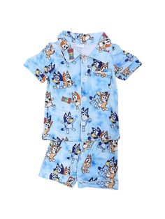 Unleash nighttime fun with our Blue Dog Button Up Blue Short Sleeve Pajama Set. Featuring a playful blue dog print on a cozy blue background, this set is perfect for bedtime adventures. The button-up top and shorts ensure comfort and ease, while the adorable design adds a touch of whimsy to your little one's sleep routine. And be sure to check out our other must have new arrivals. INCLUDES: 2 Piece Pajama Set FIT: This item is true to size FABRIC & CARE: Cotton/poly blend Machine washable AVAILA Blue Cotton Sets With Character Print, Blue Cotton Character Print Sets, Playful Light Blue Sleepwear For Pajama Party, Playful Light Blue Sleepwear For Bedtime, Blue Character Print Sleepwear For Pajama Party, Blue Character Print Sleepwear, Blue Playful Character Print Sets, Playful Light Blue Cartoon Print Sets, Blue Character Print Loungewear Sets