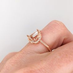 This beautiful ring semi mount - available in white gold and rose gold - features an 8mm trillion shape basket with natural earth mined diamonds set in solid 14K gold. This ring setting would be perfect for the center gemstone of your choice and can be a lovely birthstone gift for your loved ones! This ring is made with solid 14K Gold and natural Earth mined SI / G-H diamonds. If you're interested in purchasing this setting with a center stone please message us! Trillion Cut Ethical Diamond Ring In Rose Gold, Rose Gold Diamond Rings With Trillion Cut, Trillion Cut Ring, Designer Silver Jewellery, Jewelry Showcases, Birthstone Gifts, Ring Setting, Natural Earth, Beautiful Ring