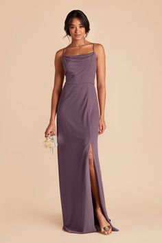 a woman in a long purple dress