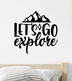 a wall decal with the words let's go explore in black on it